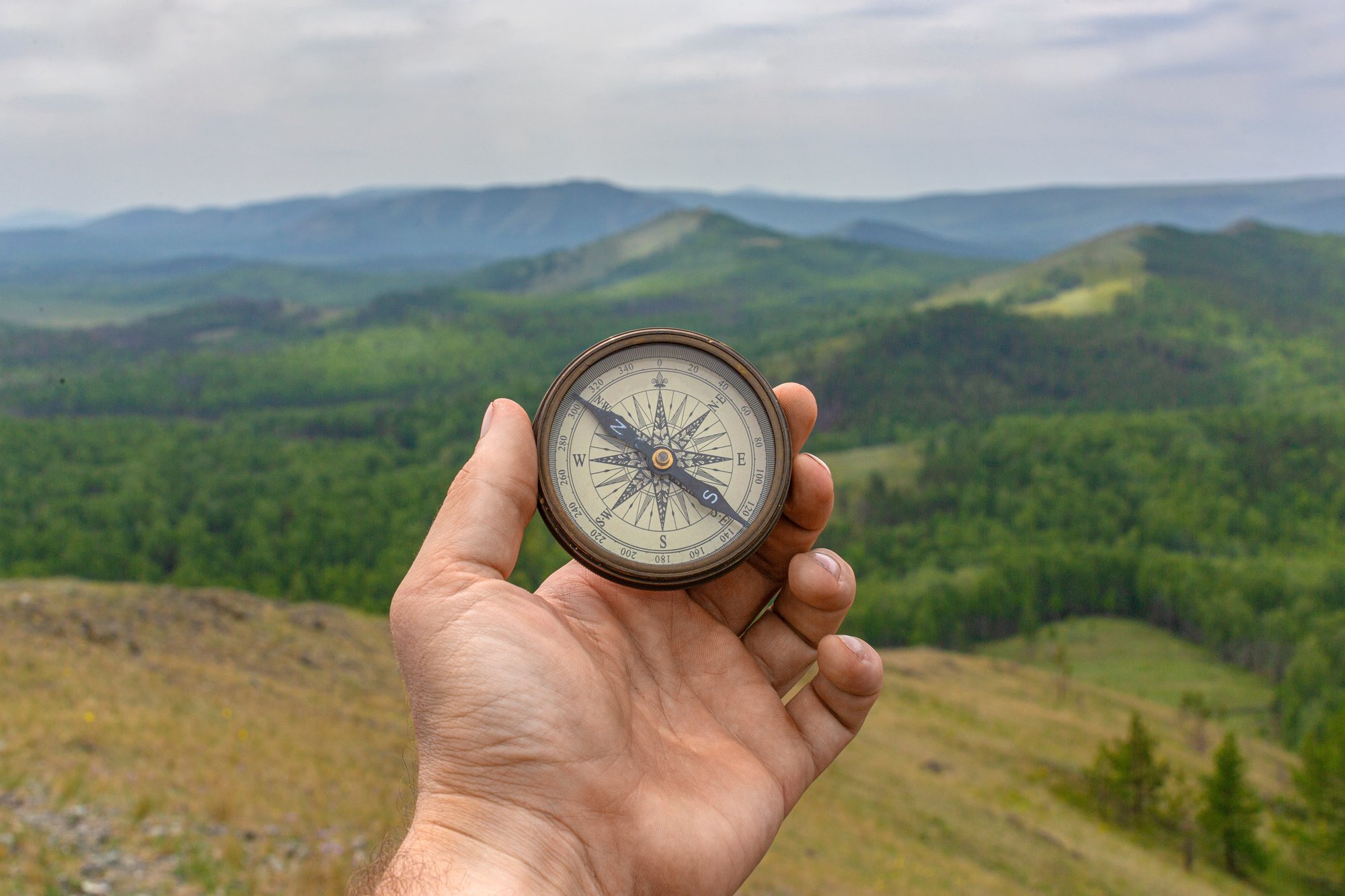 strategic-guidance-compass-mountains-leadership