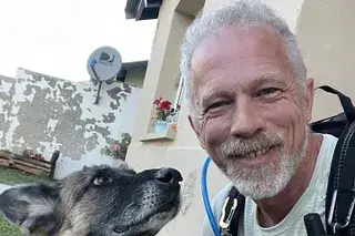 smiling-man-dog-companionship-waypoints-strategy