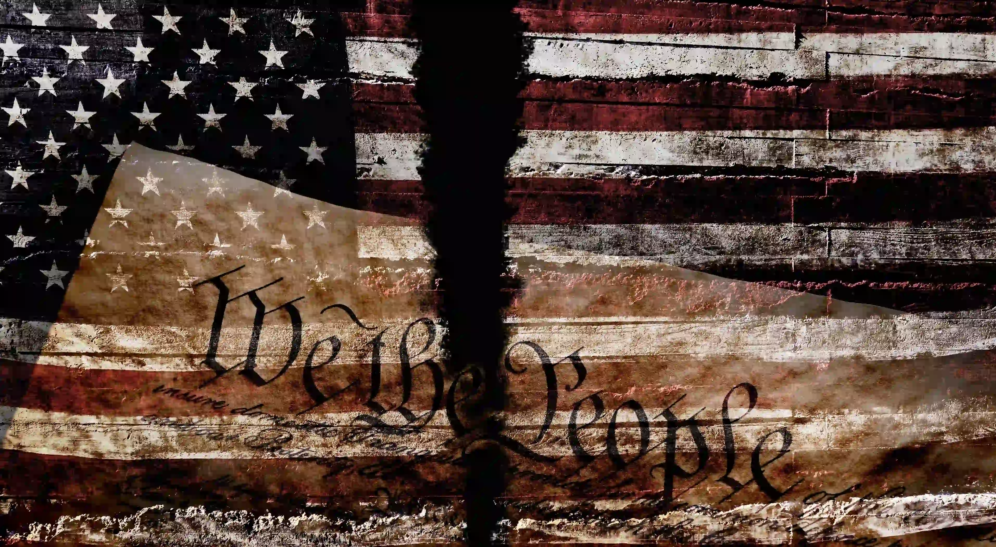 Torn American flag overlaid with the U.S. Constitution text "We the People", symbolizing political division and authoritarian threats.